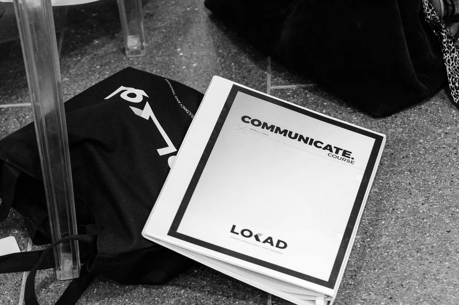 LOKAD "Communicate" course booklet and tote bag
